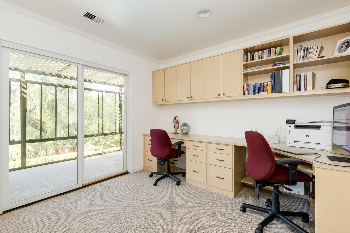 728 Tolman Drive Stanford, CA 94305 - Photo 16 of 27 a view of a workspace with furniture and a window