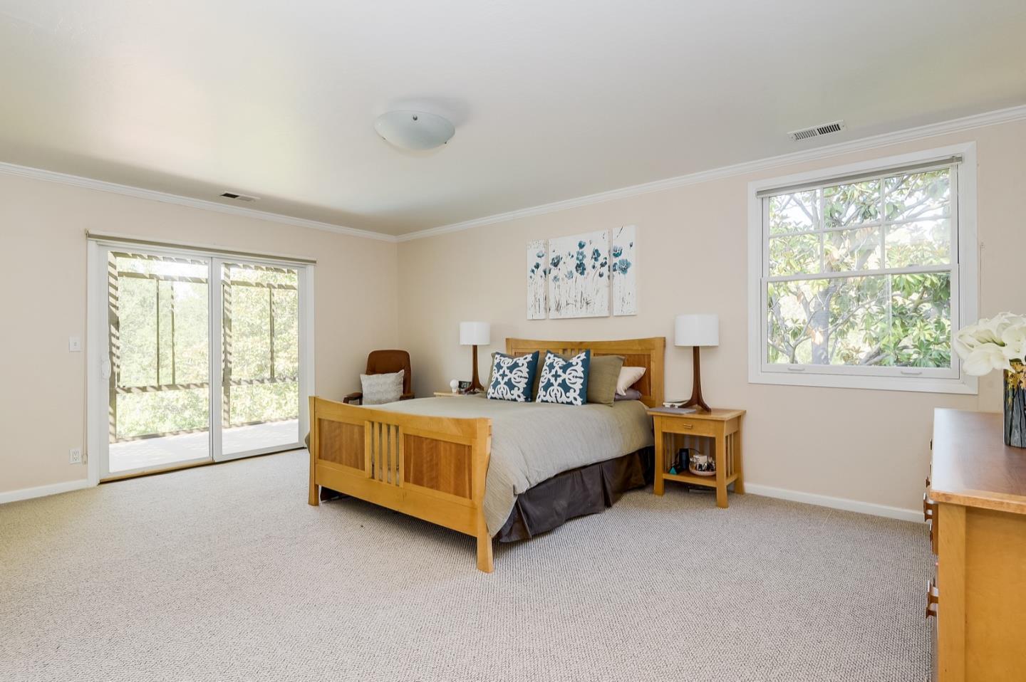 728 Tolman Drive Stanford, CA 94305 - Photo 19 of 27 a spacious bedroom with a bed and a window