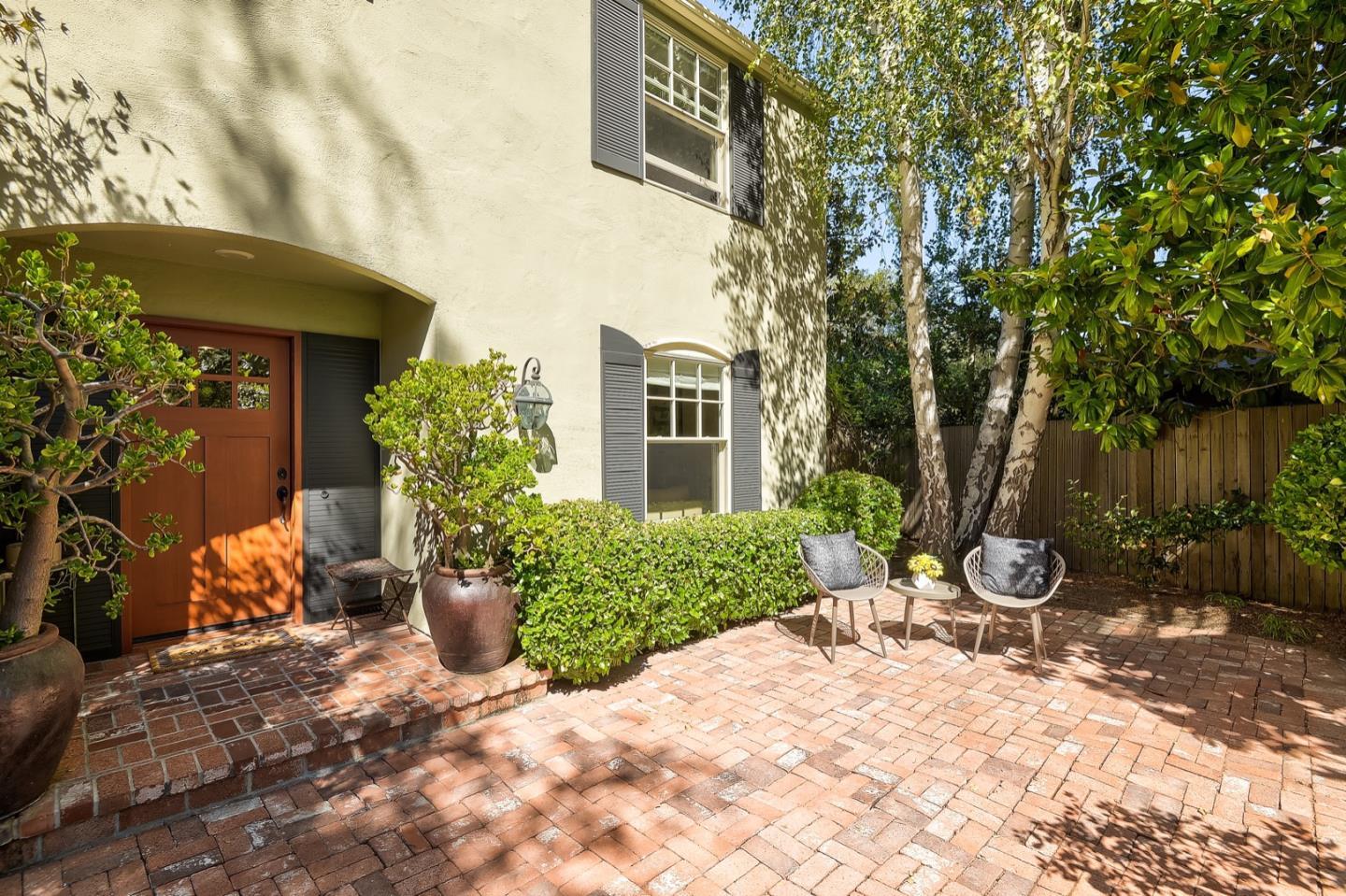 728 Tolman Drive Stanford, CA 94305 - Photo 3 of 27 a front view of a house with garden