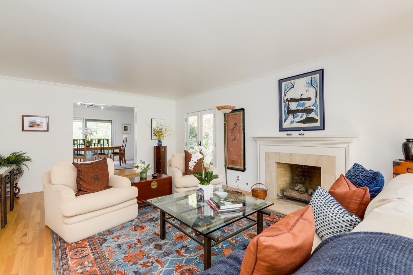 728 Tolman Drive Stanford, CA 94305 - Photo 4 of 27 a living room with furniture and a fireplace