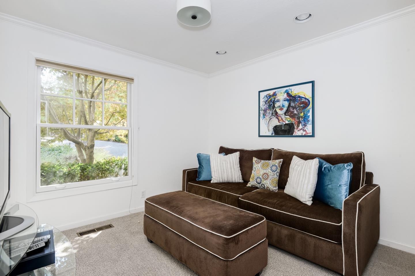 728 Tolman Drive Stanford, CA 94305 - Photo 10 of 27 a living room with furniture and a window