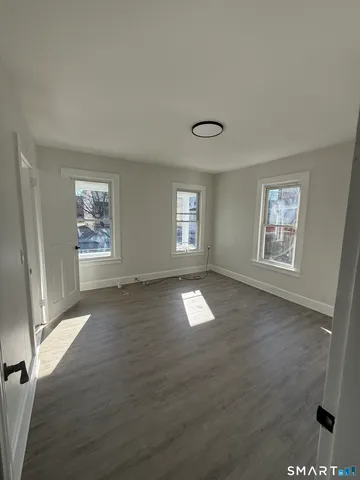 a view of empty room with front door
