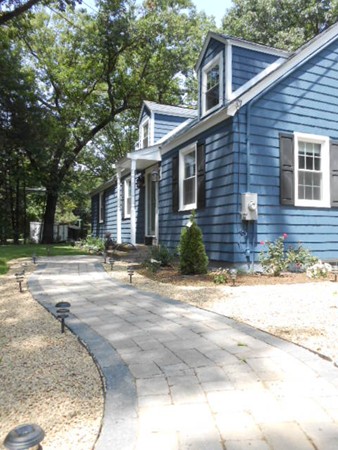 211 Randall Road Stow, MA 01775 - Photo 1 of 30 a view of a house with a yard and large tree