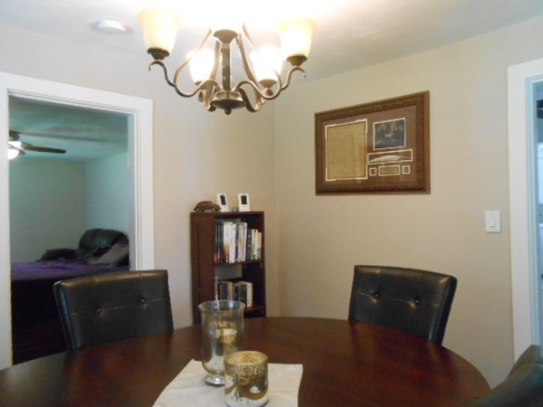 211 Randall Road Stow, MA 01775 - Photo 14 of 30 a living room with furniture and a window