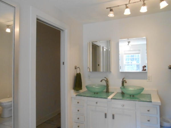 211 Randall Road Stow, MA 01775 - Photo 19 of 30 a bathroom with a granite countertop sink and a mirror