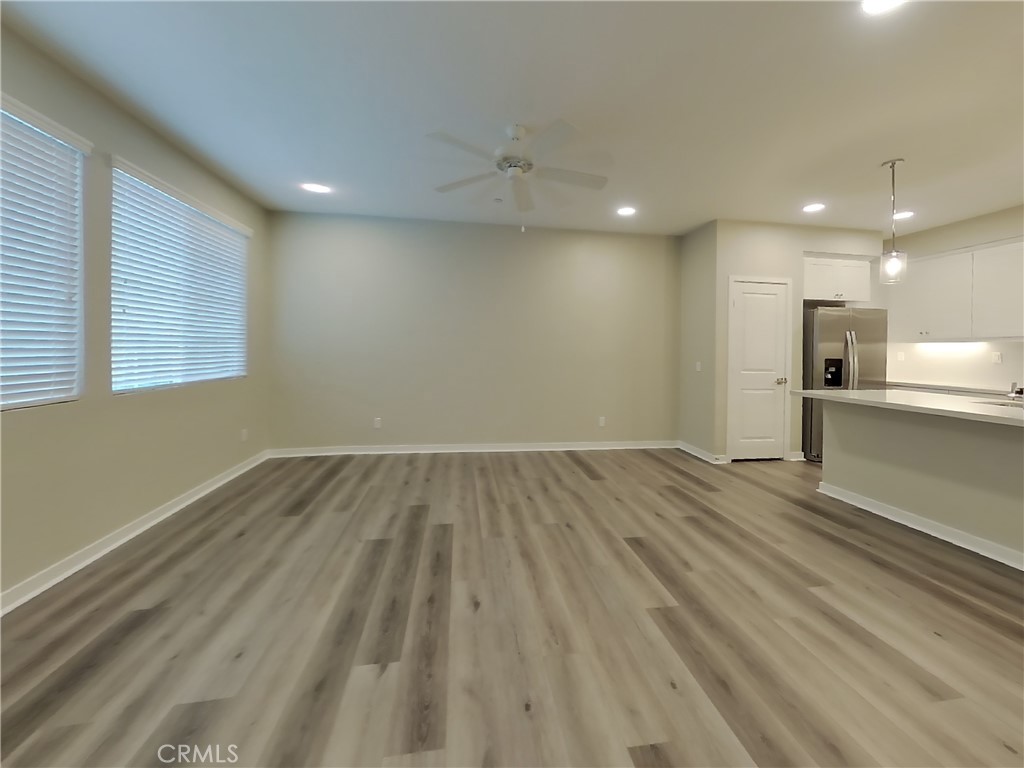 36519 Hasta Way Wildomar, CA 92595 - Photo 4 of 32 a view of a kitchen with a sink and wooden floor