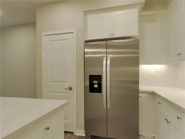 a bathroom with a shower and a sink