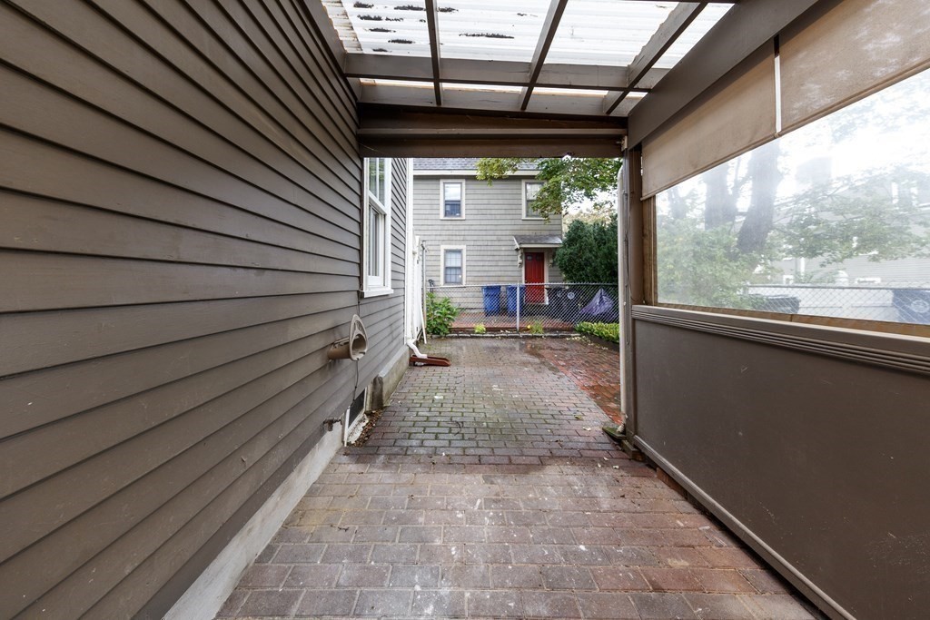 7 Herbert Street Salem, MA 01970 - Photo 16 of 17 a view of a porch with wooden floor and outdoor space