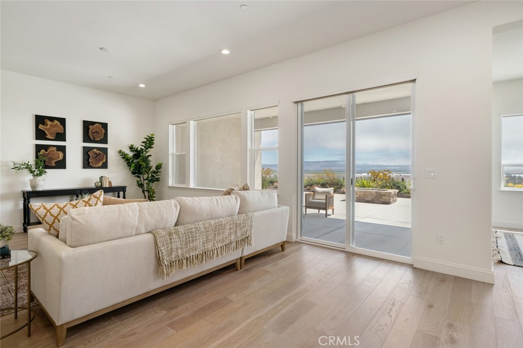 1622 Eucalyptus Road Nipomo, CA 93444 - Photo 14 of 73 a living room with furniture and a large window