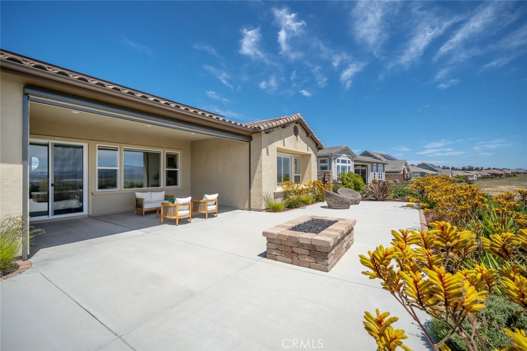 1622 Eucalyptus Road Nipomo, CA 93444 - Photo 15 of 73 a view of a house with swimming pool and sitting area