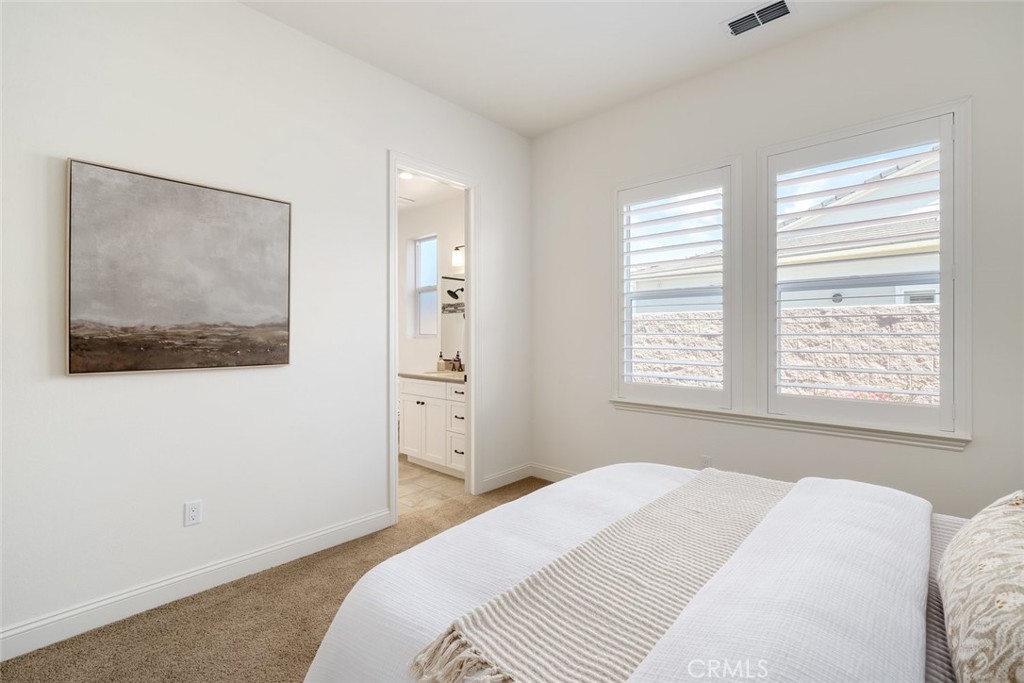 1622 Eucalyptus Road Nipomo, CA 93444 - Photo 33 of 73 a bedroom with a bed and a window