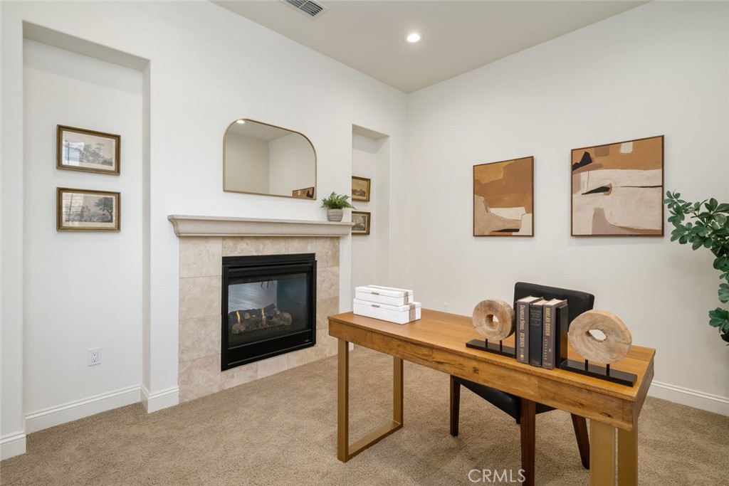1622 Eucalyptus Road Nipomo, CA 93444 - Photo 36 of 73 a living room with furniture and a fireplace