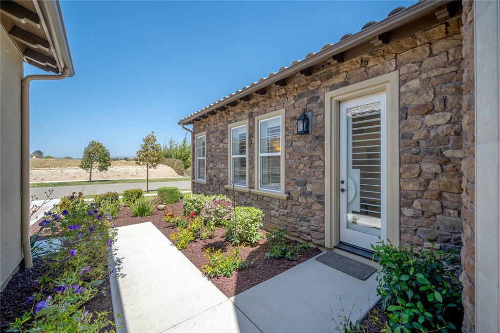 1622 Eucalyptus Road Nipomo, CA 93444 - Photo 43 of 73 a front view of a house with garden