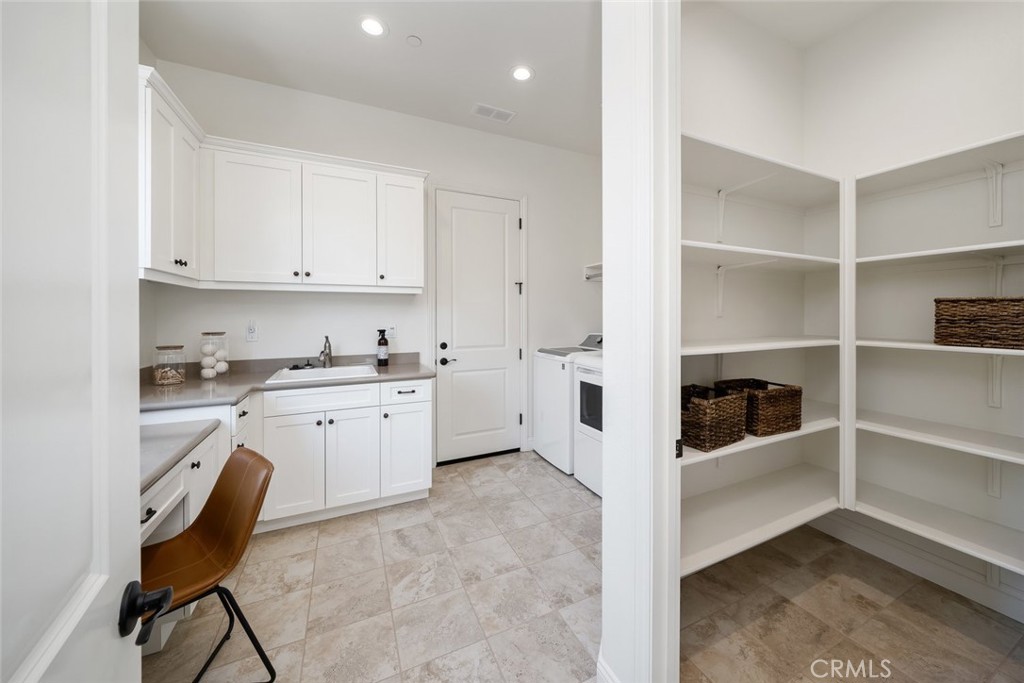 1622 Eucalyptus Road Nipomo, CA 93444 - Photo 53 of 73 a view of kitchen with white cabinets