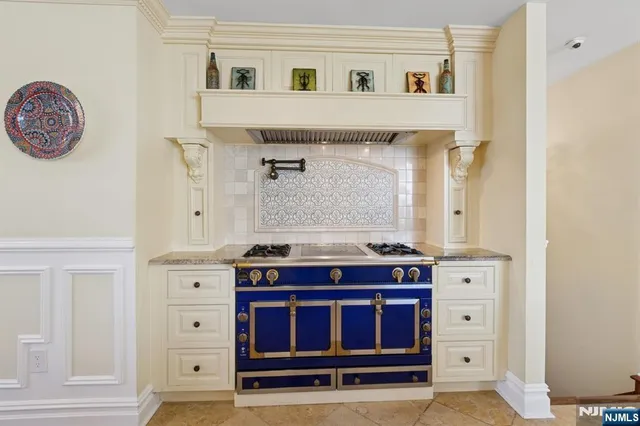 a view of kitchen with cabinets and wooden floor