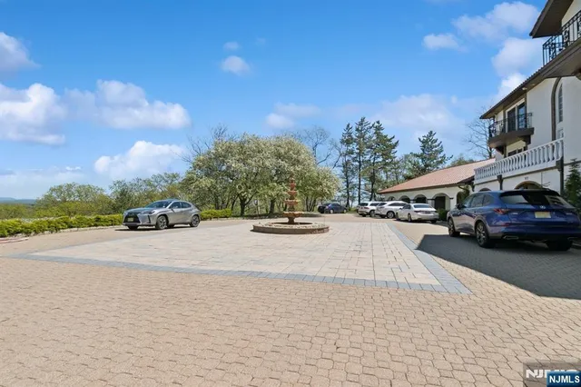 a view of a street with cars
