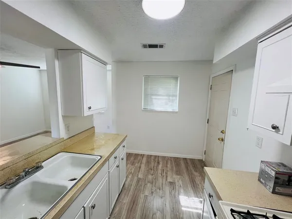 a room with a table and chairs