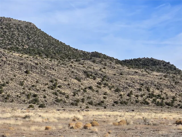 a view of mountain with sky view