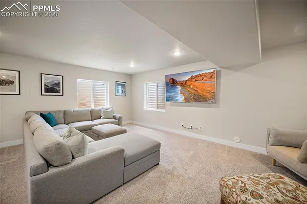 a living room with furniture and a couch