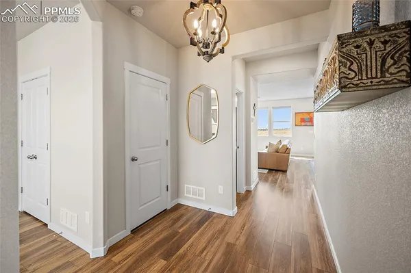 a very nice looking room with wooden floor