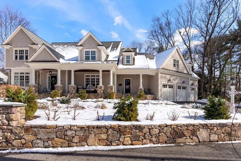 178 Lowell Road Wellesley, MA 02481 - Photo 1 of 38 a front view of a house with yard porch and furniture