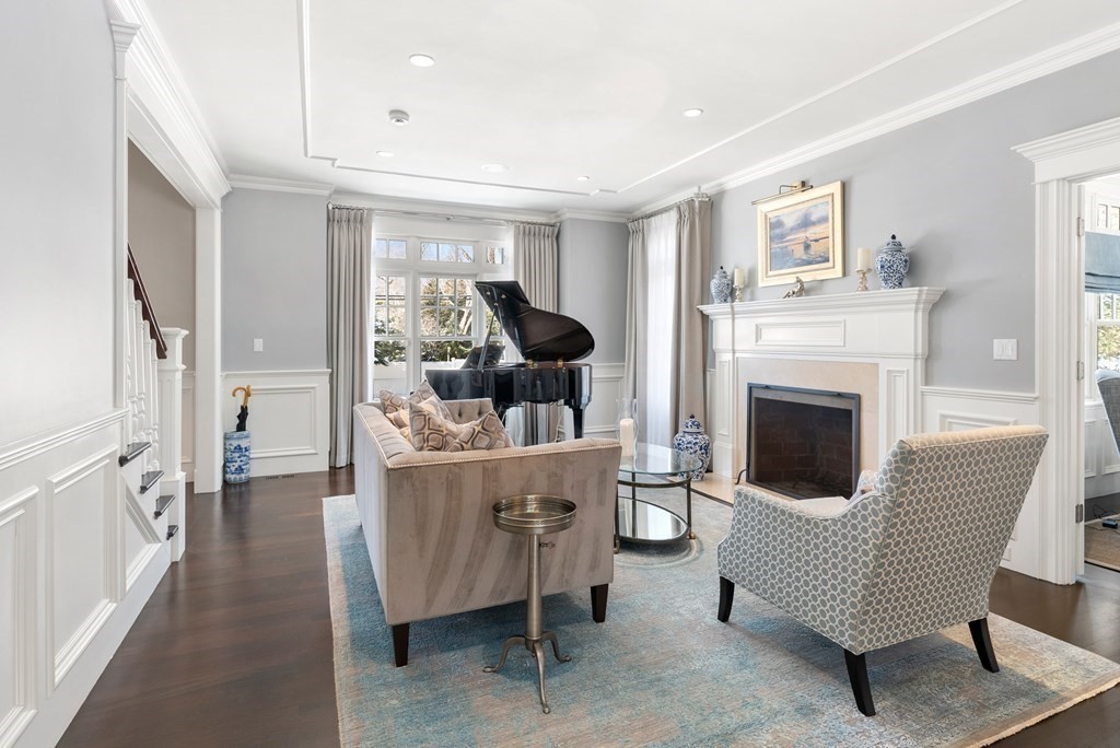 178 Lowell Road Wellesley, MA 02481 - Photo 14 of 38 a living room with furniture and a fireplace