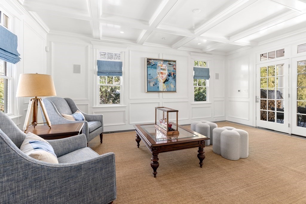 178 Lowell Road Wellesley, MA 02481 - Photo 15 of 38 a living room with furniture and a lamp