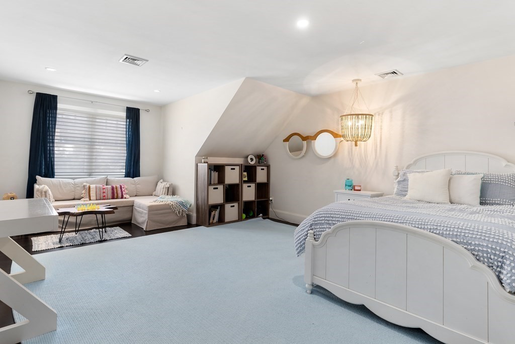 178 Lowell Road Wellesley, MA 02481 - Photo 28 of 38 a bedroom with bed couch and window