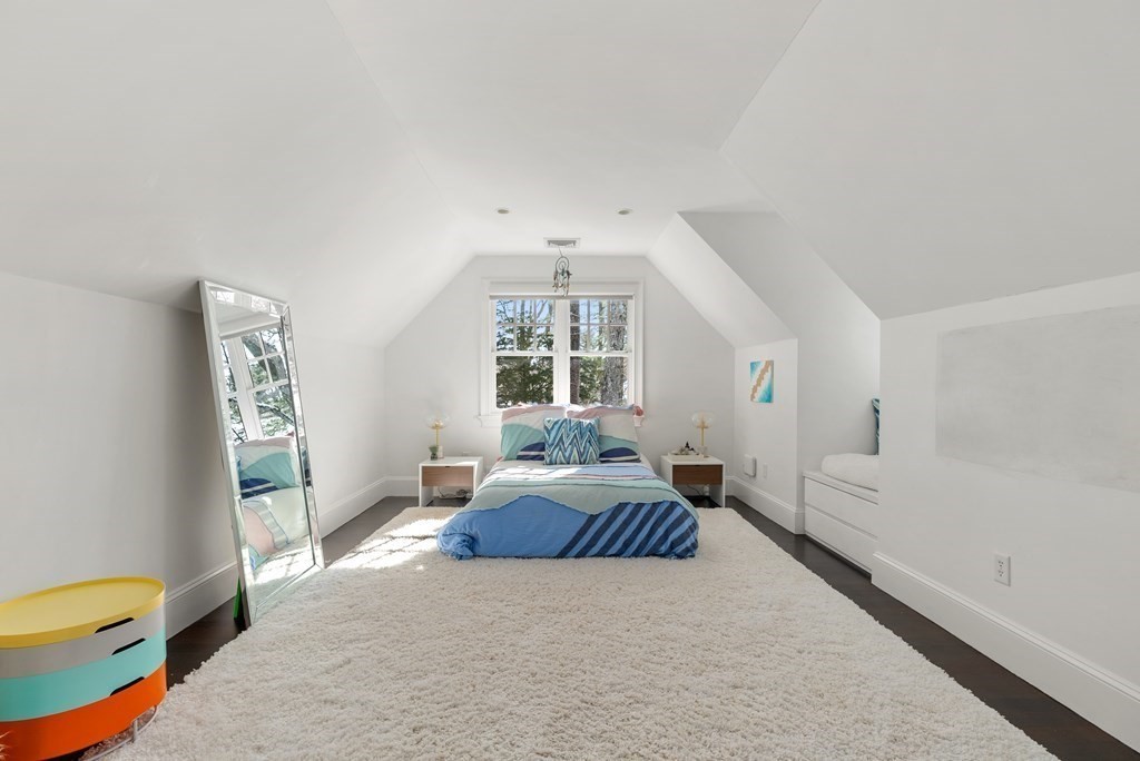178 Lowell Road Wellesley, MA 02481 - Photo 30 of 38 a spacious bedroom with a bed and a window