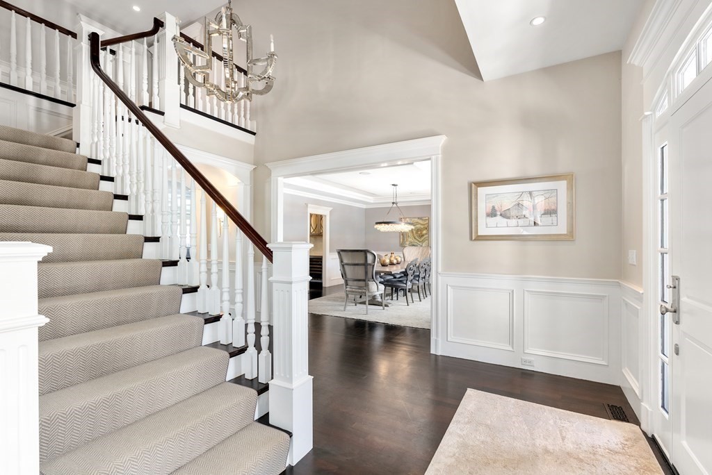 178 Lowell Road Wellesley, MA 02481 - Photo 32 of 38 a view of entryway and hall with wooden floor