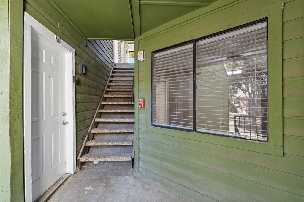 9831 Walnut Street, Unit 205 Dallas, TX 75243 - Photo 2 of 29 View of staircase