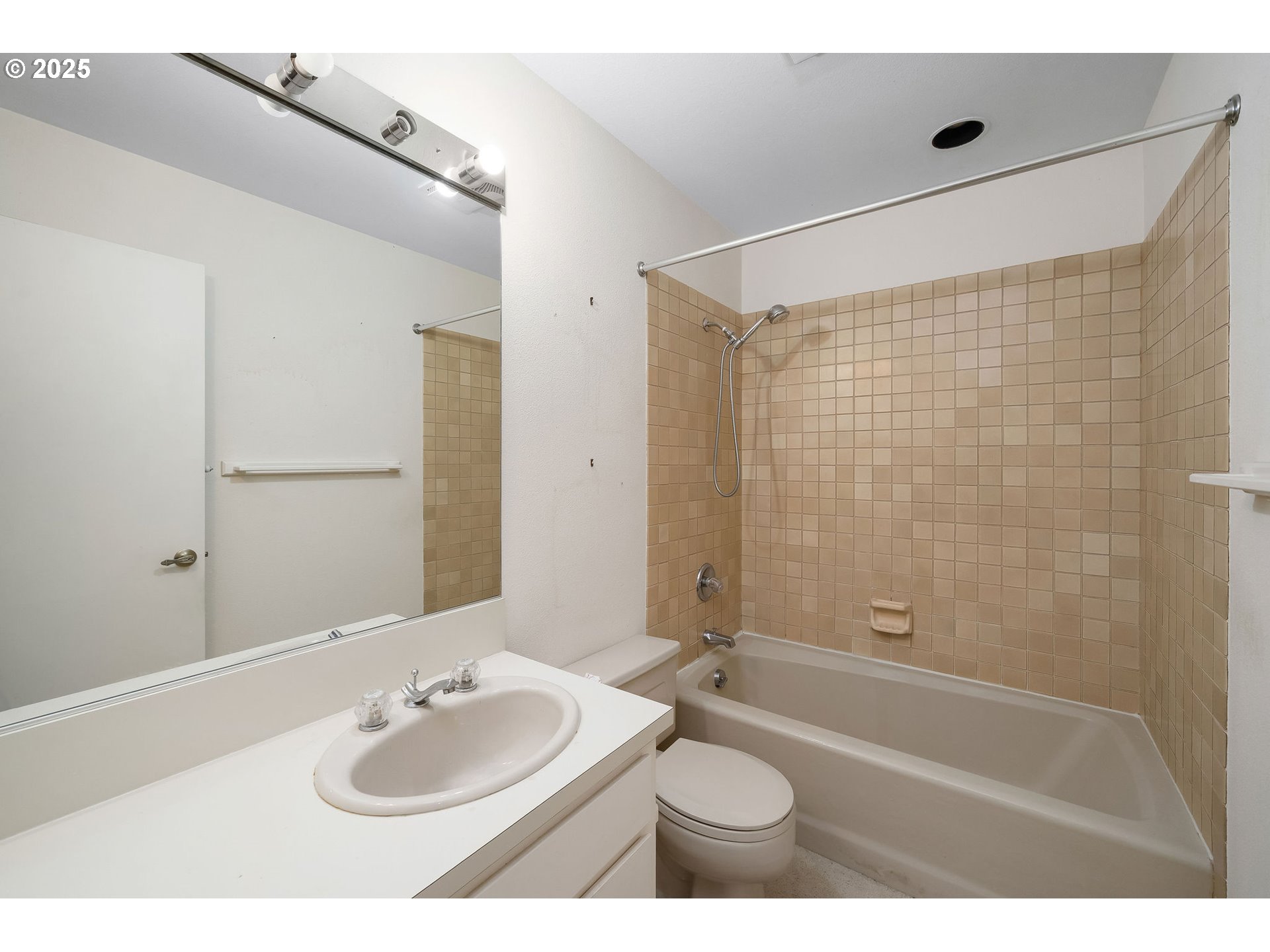 7104 Southwest Chapel Lane Portland, OR 97223 - Photo 30 of 36 a bathroom with a sink shower bathtub and a toilet