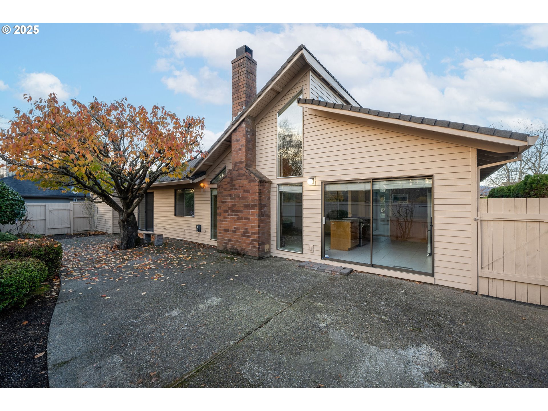 7104 Southwest Chapel Lane Portland, OR 97223 - Photo 31 of 36 a view of a house with a yard