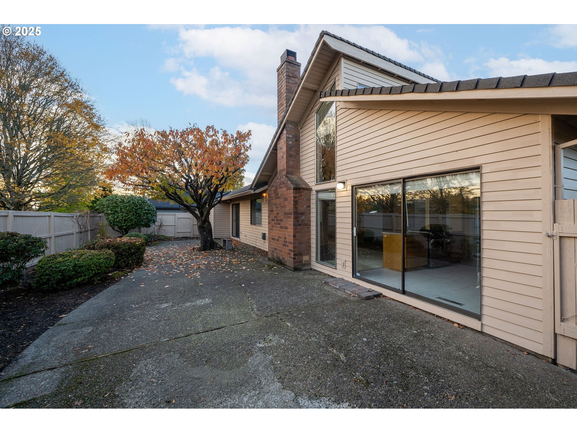 7104 Southwest Chapel Lane Portland, OR 97223 - Photo 32 of 36 a backyard of a house with lots of green space