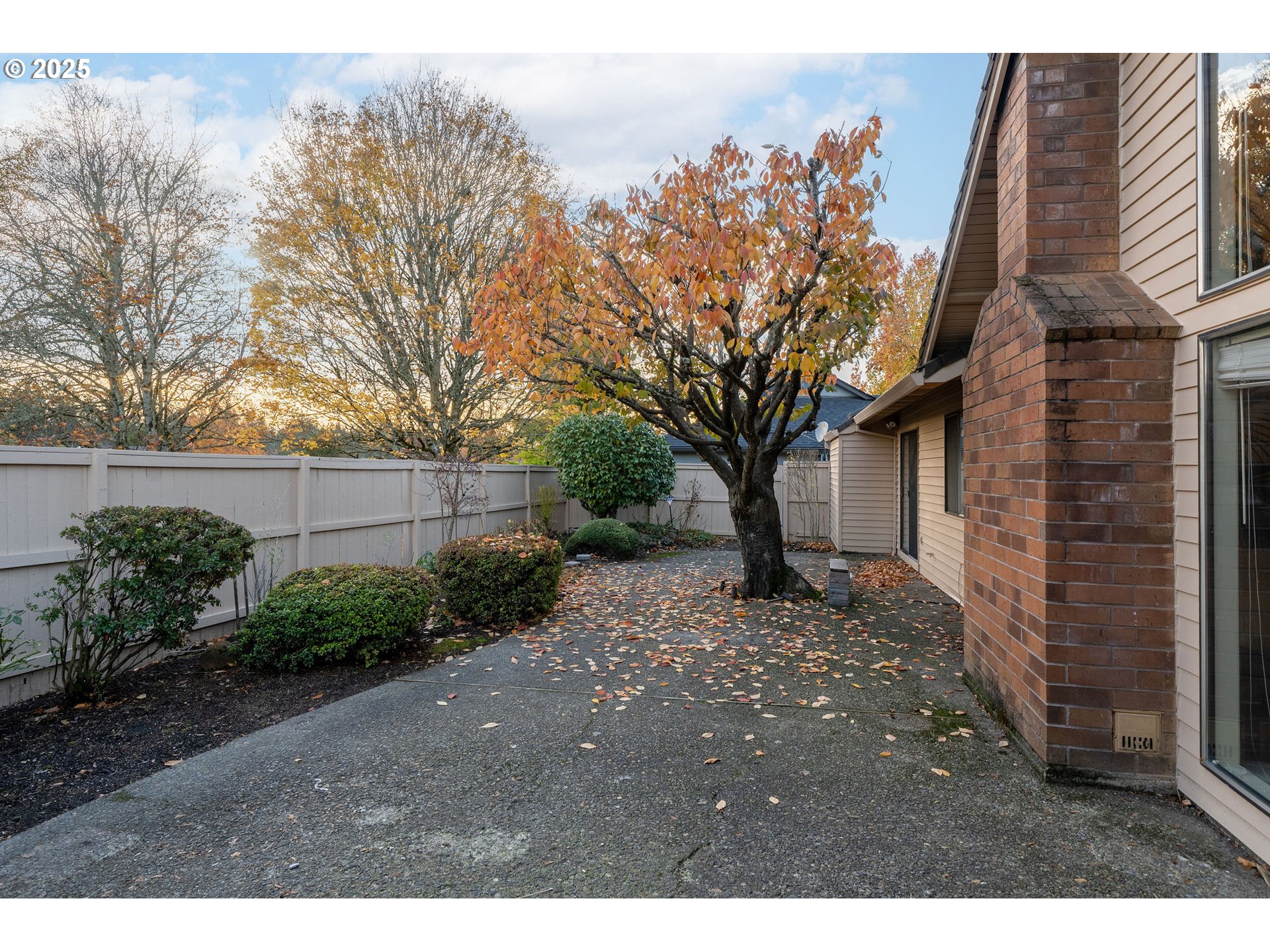 7104 Southwest Chapel Lane Portland, OR 97223 - Photo 33 of 36 a backyard of a house with lots of green space