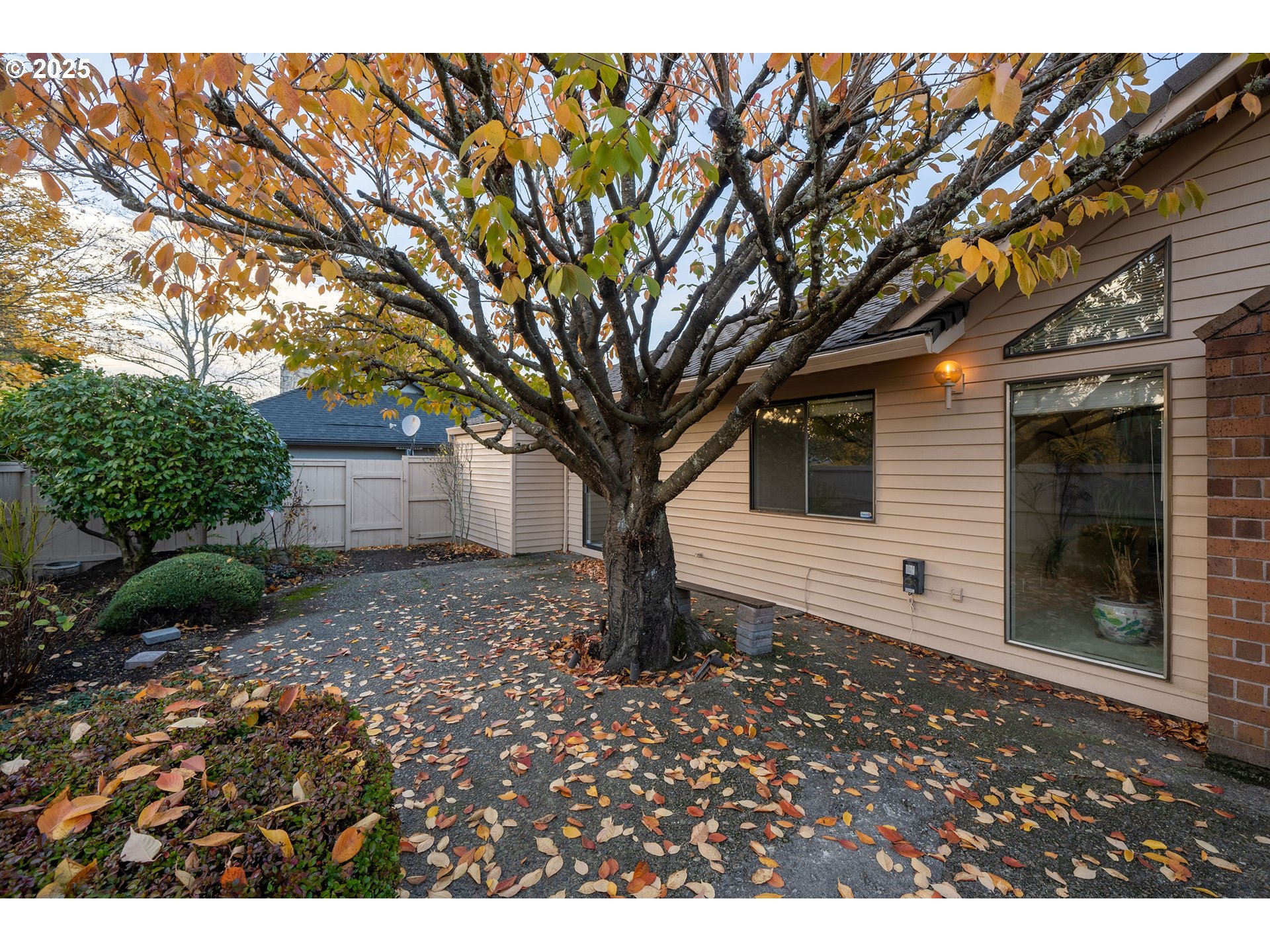 7104 Southwest Chapel Lane Portland, OR 97223 - Photo 34 of 36 a backyard of a house with lots of green space