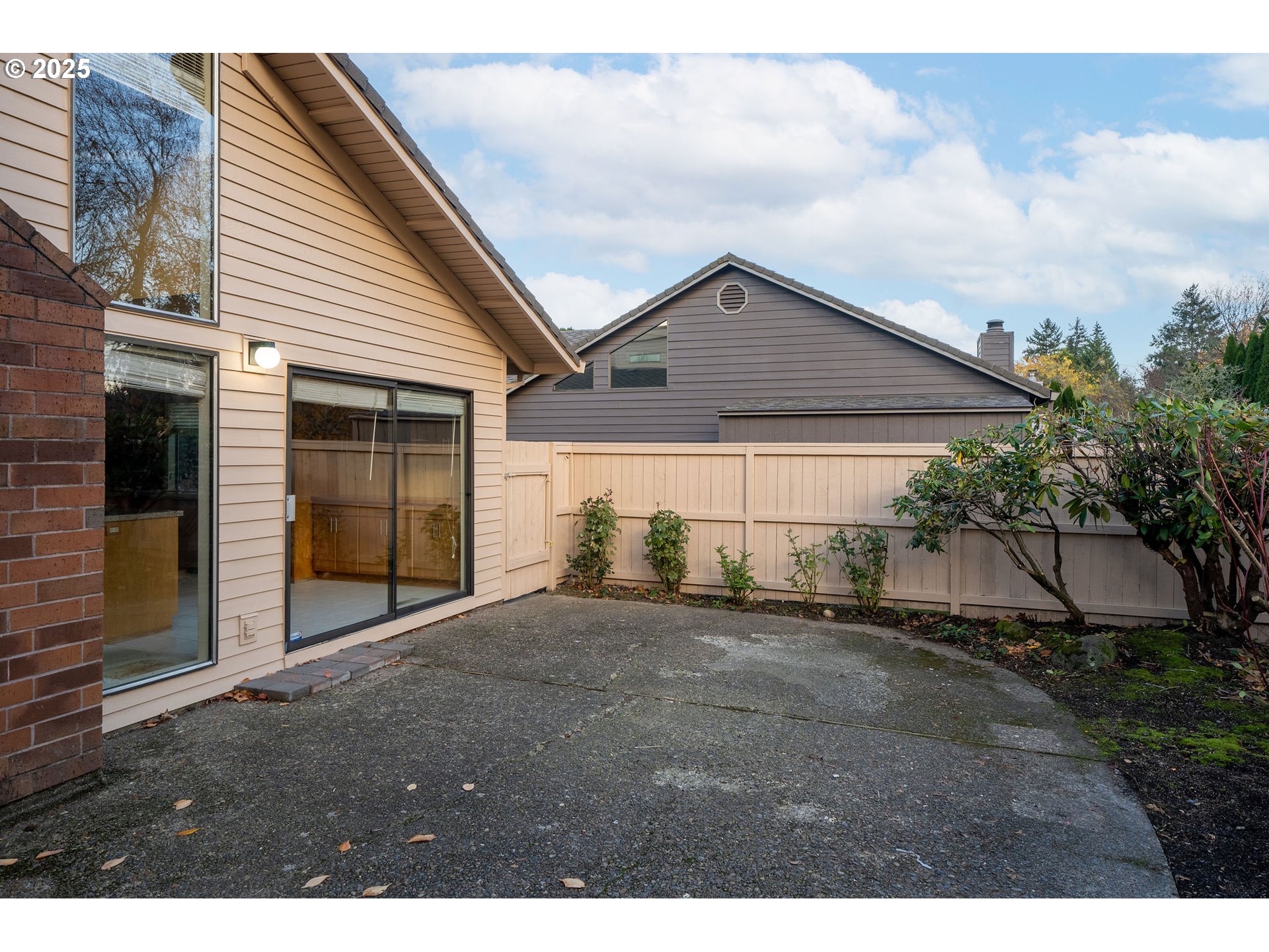 7104 Southwest Chapel Lane Portland, OR 97223 - Photo 35 of 36 a view of a house with a yard and garage