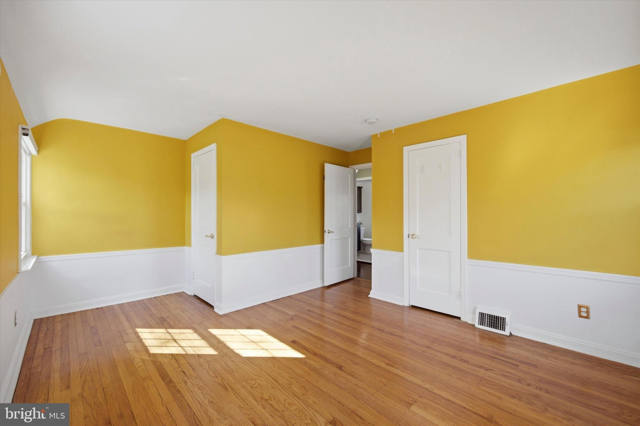 436 Kerr Lane Springfield, PA 19064 - Photo 27 of 52 a view of an empty room with wooden floor