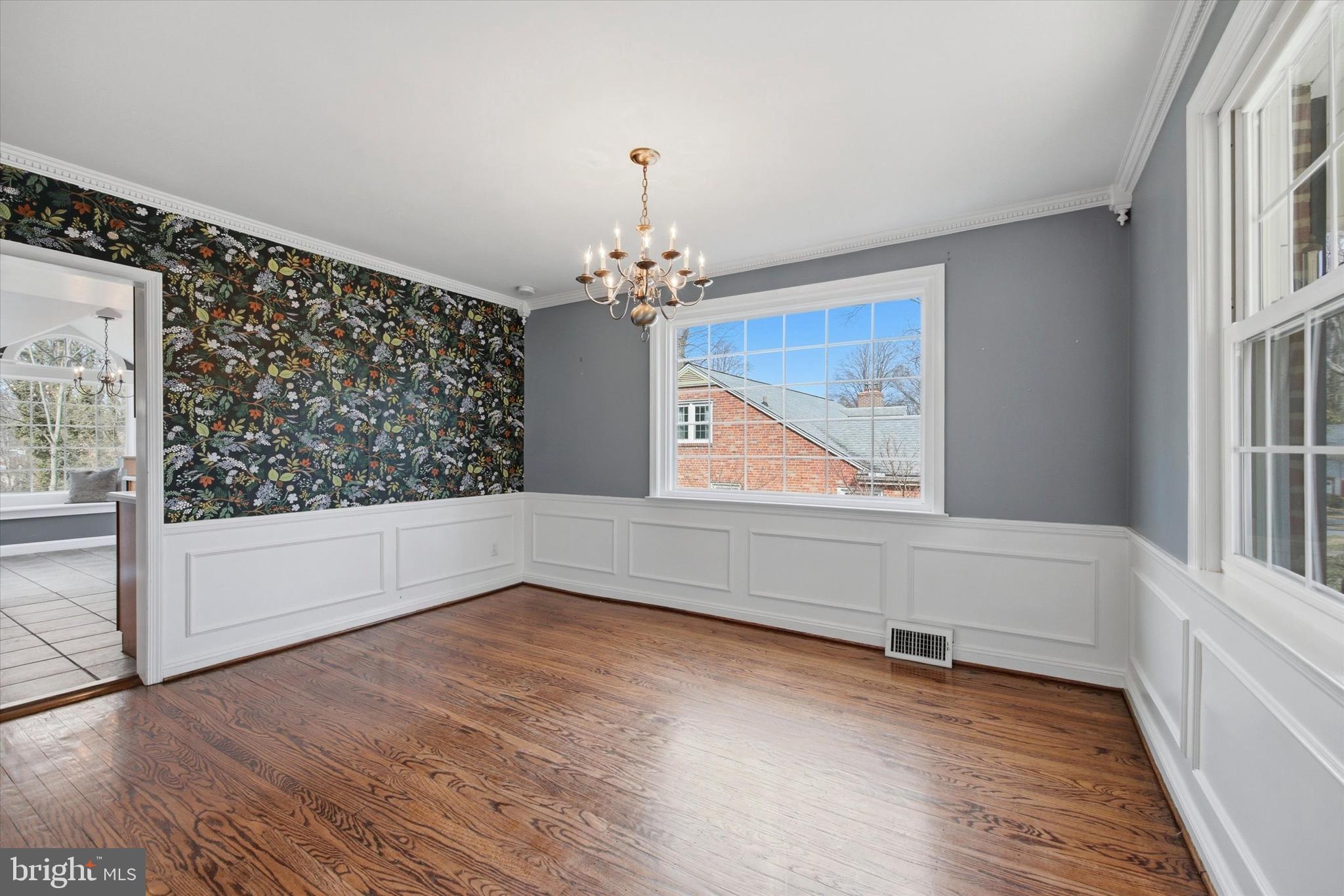 436 Kerr Lane Springfield, PA 19064 - Photo 8 of 52 a view of an empty room with wooden floor and a window
