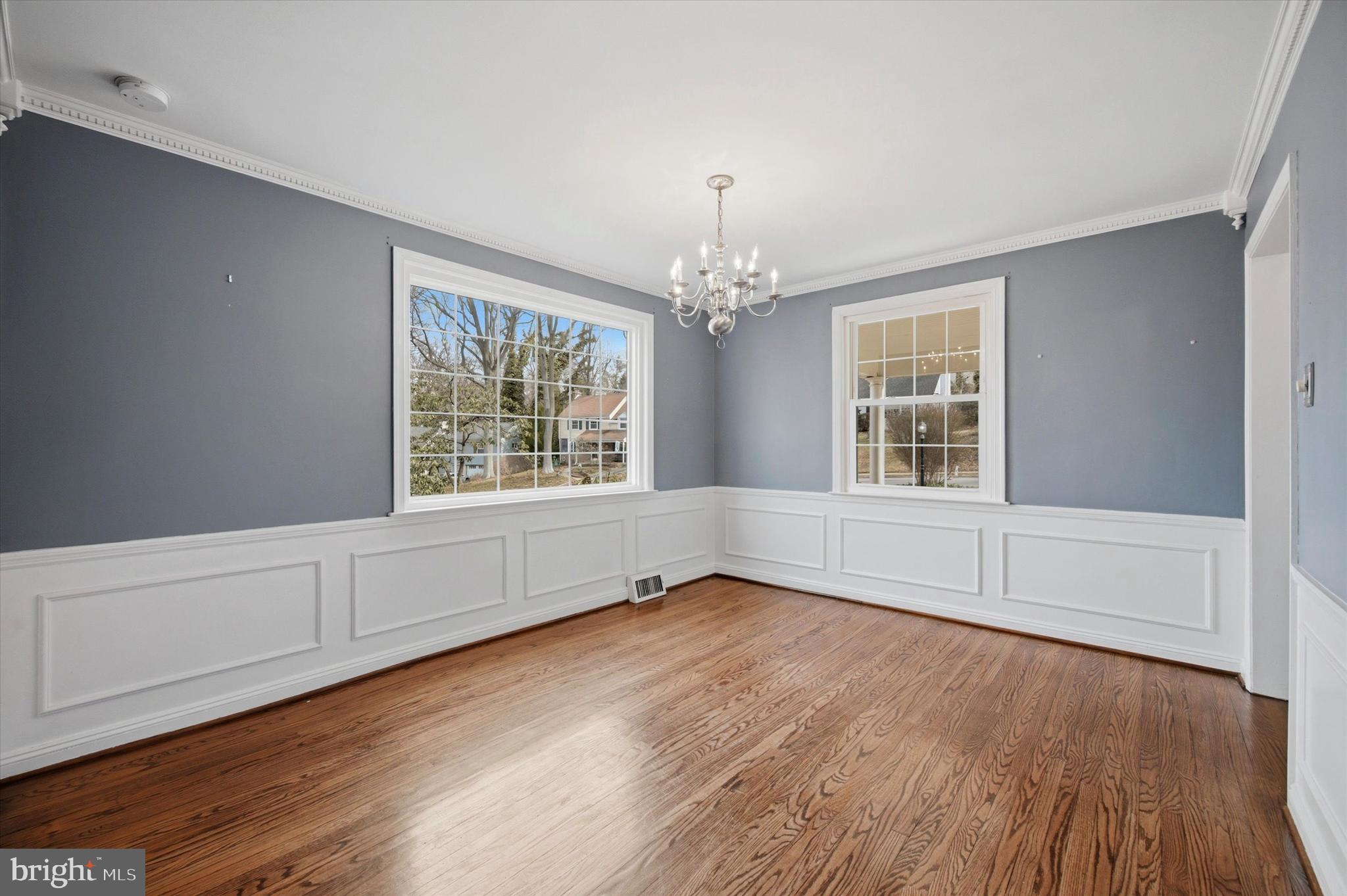 436 Kerr Lane Springfield, PA 19064 - Photo 9 of 52 a view of an empty room with wooden floor and a window