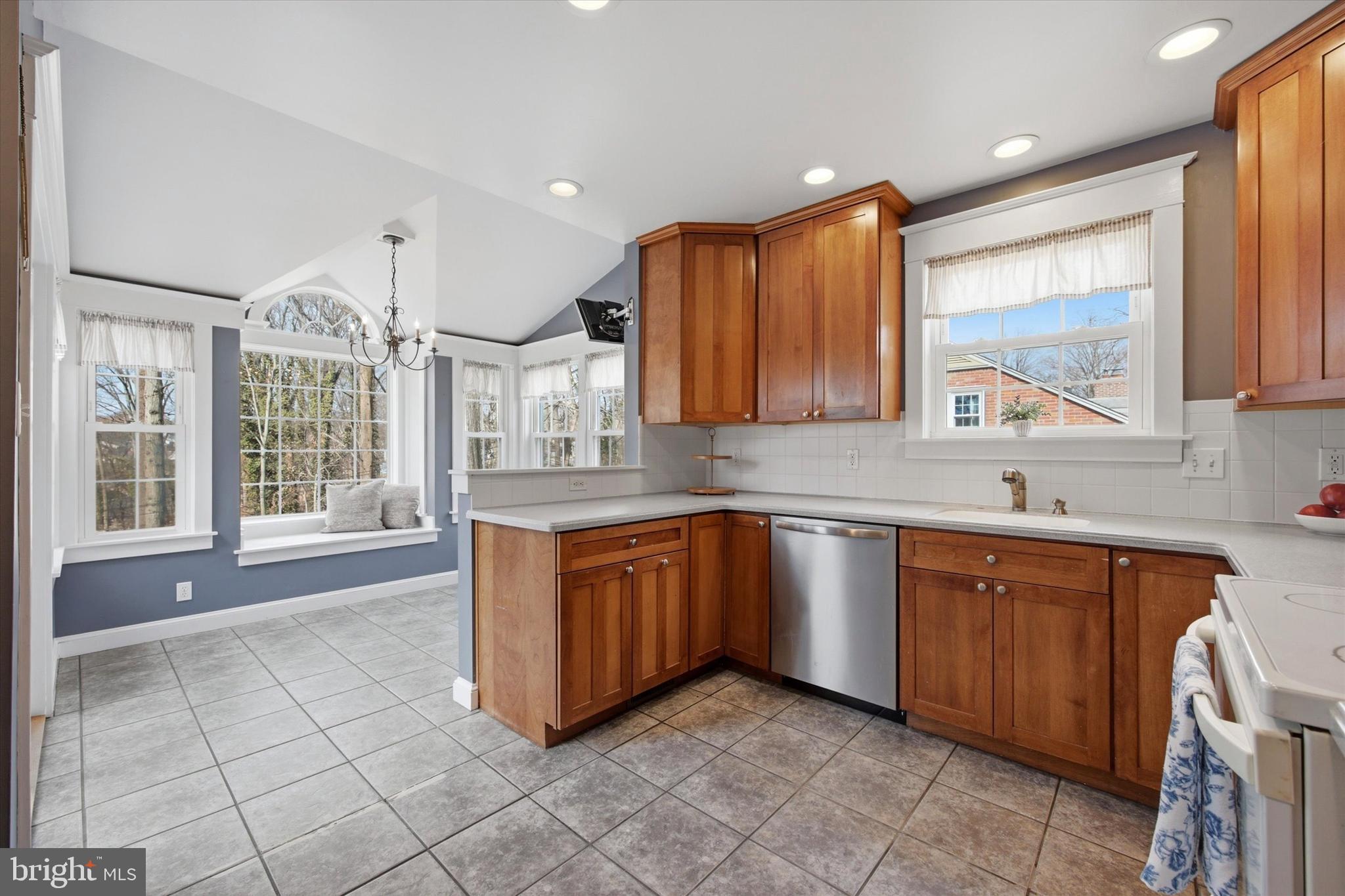 436 Kerr Lane Springfield, PA 19064 - Photo 10 of 52 a large kitchen with stainless steel appliances granite countertop a sink and cabinets
