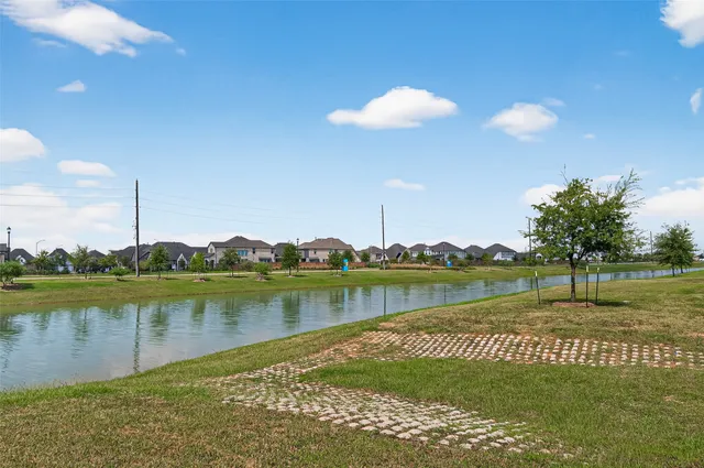 a view of a lake with a big yard