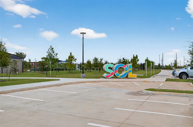 a view of a park with swings