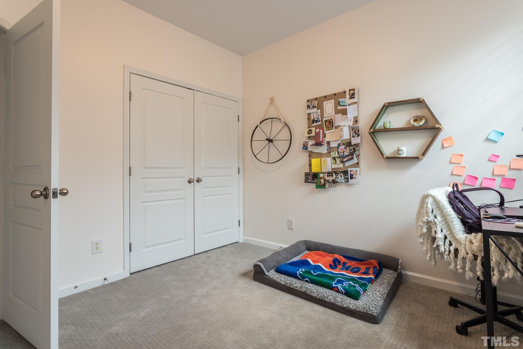 5050 Amber Clay Lane Raleigh, NC 27612 - Photo 20 of 23 a view of workspace with lounge chair