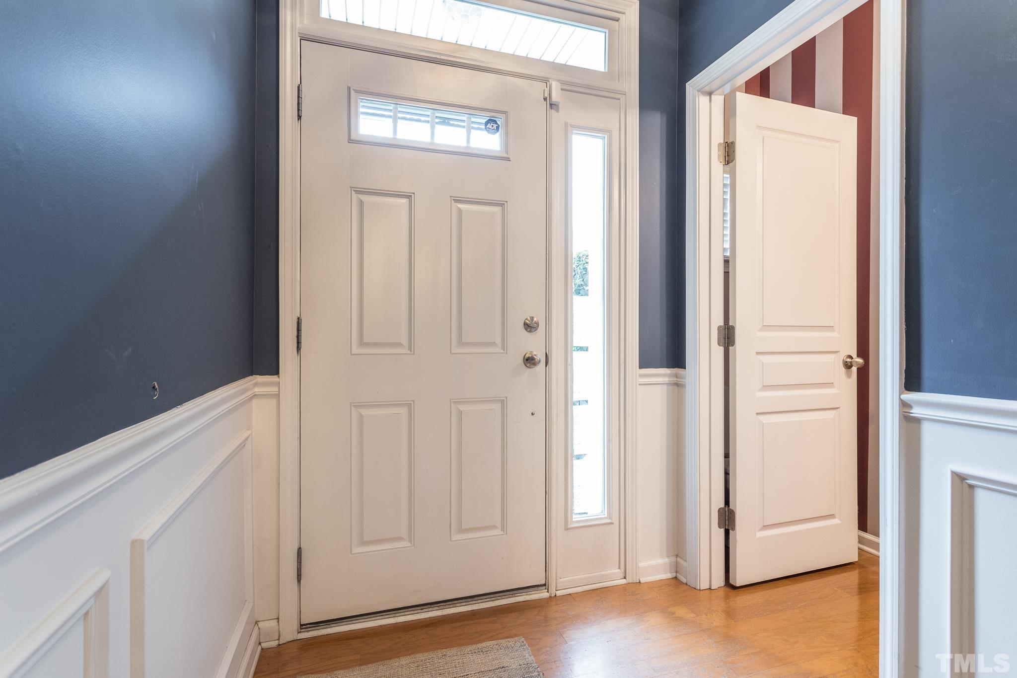 5050 Amber Clay Lane Raleigh, NC 27612 - Photo 5 of 23 a view of front door with a door