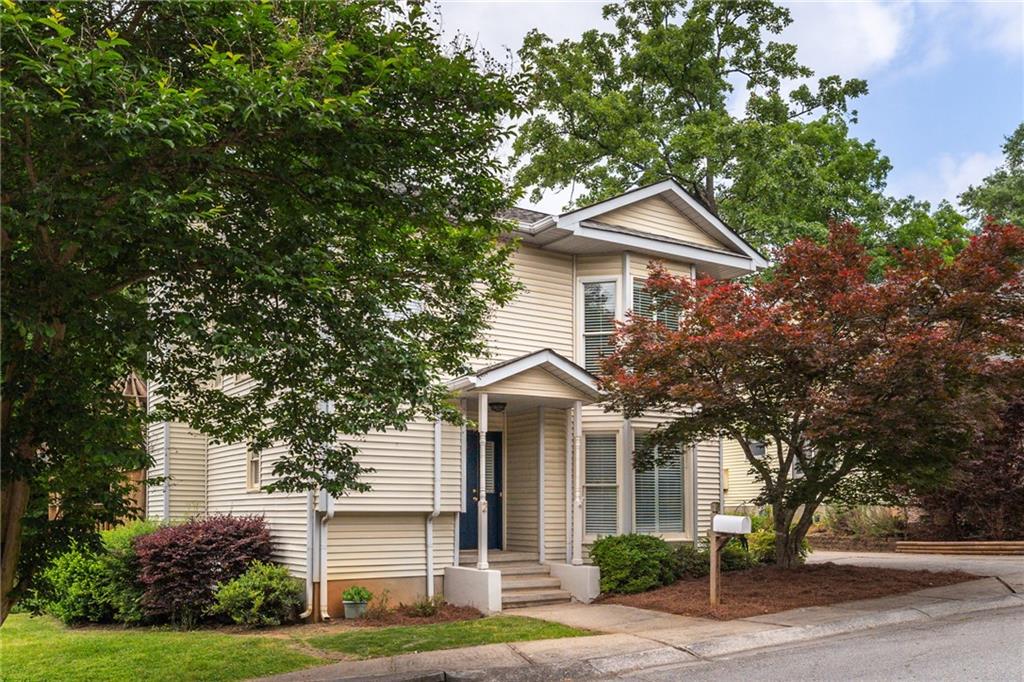 2 Old Decatur Circle Decatur, GA 30030 - Photo 1 of 1 a front view of a house with a yard and trees