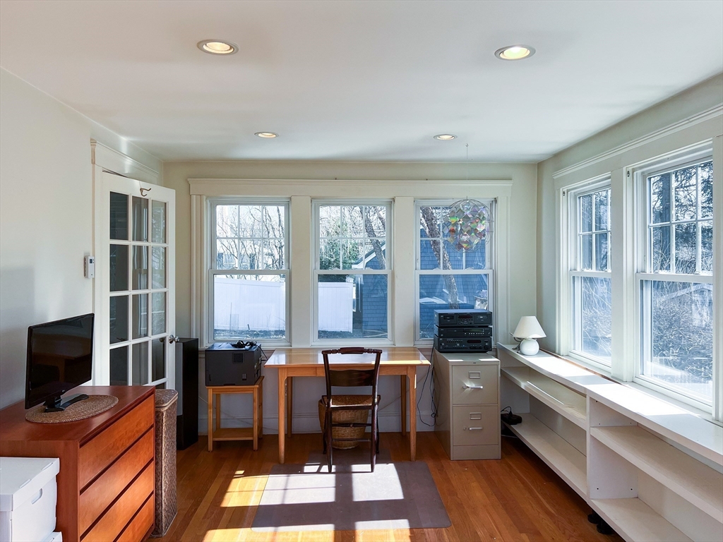 32 Emerson Road Needham, MA 02492 - Photo 12 of 27 a view of a workspace with furniture and a window