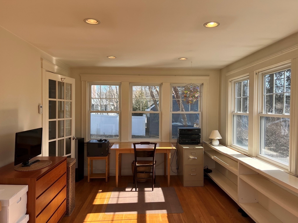 32 Emerson Road Needham, MA 02492 - Photo 13 of 27 a room with lots of furniture and a large window