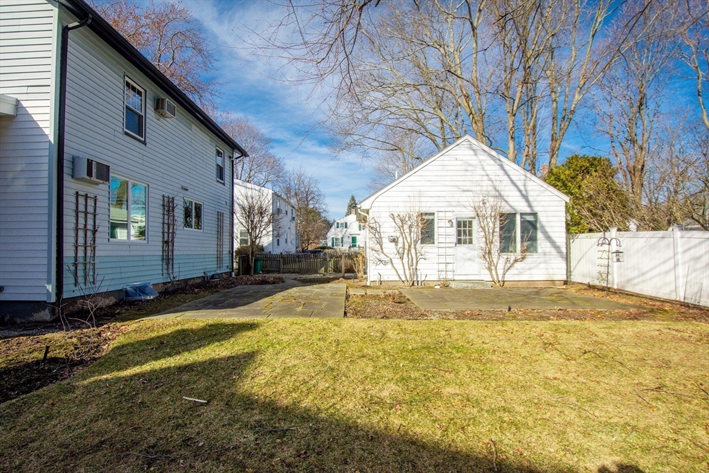 32 Emerson Road Needham, MA 02492 - Photo 26 of 27 a view of a house with a yard
