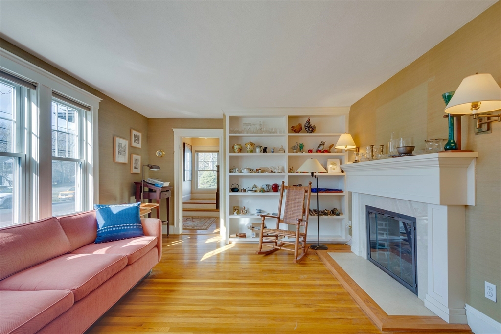 32 Emerson Road Needham, MA 02492 - Photo 4 of 27 a living room with furniture and a fireplace